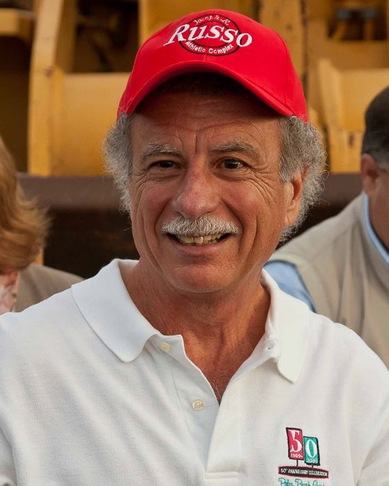 A picture of Joseph R. Russo wearing a Russo baseball cap